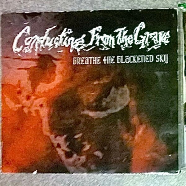 Conducting From The Grave Breathe The Blackened Sky, 2004